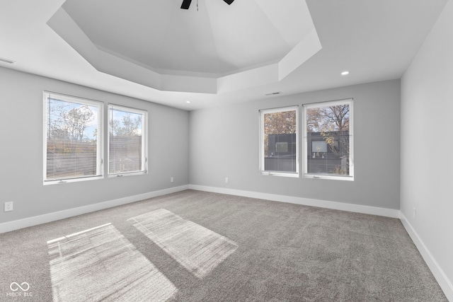 1514 E 12th St, Indianapolis, IN 46201 - carpeted spare room featuring a raised ceiling, plenty of natural light, ceiling fan, baseboards, and recessed lighting