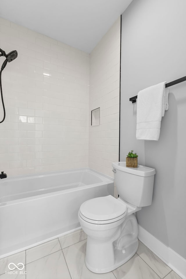 1514 E 12th St, Indianapolis, IN 46201 - full bath with marble finish floors, toilet, shower / bath combination, and baseboards