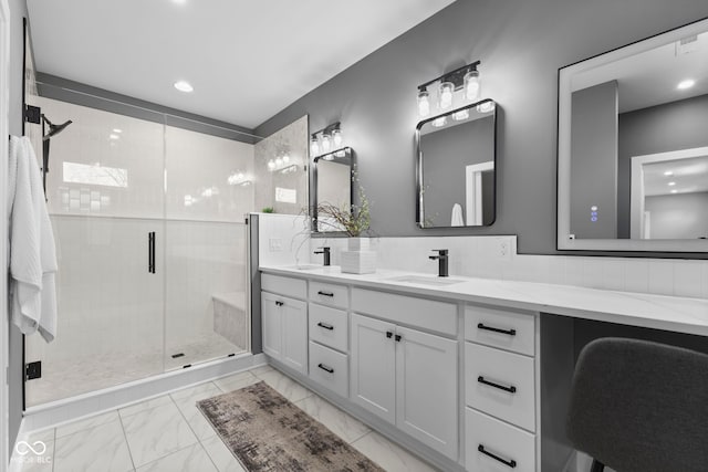 1514 E 12th St, Indianapolis, IN 46201 - full bathroom with double vanity, a stall shower, marble finish flooring, and recessed lighting