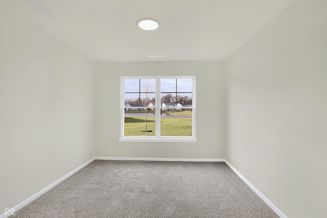 view of carpeted spare room