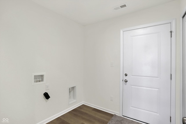 washroom with dark wood-type flooring and washer hookup