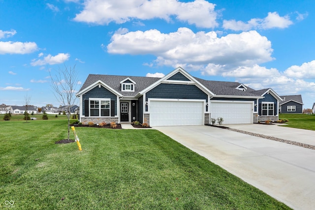 craftsman-style house featuring a front lawn and a garage