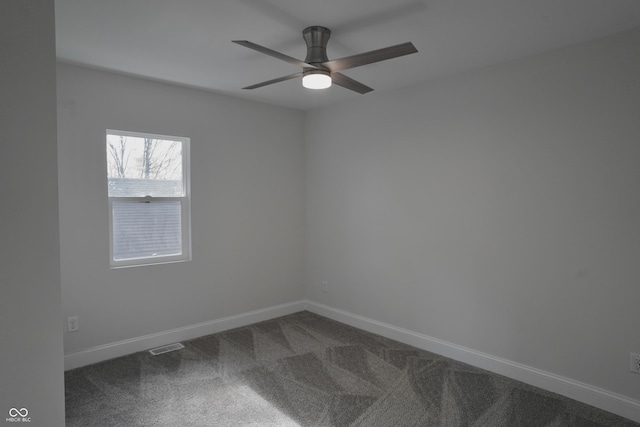 unfurnished room with carpet and ceiling fan