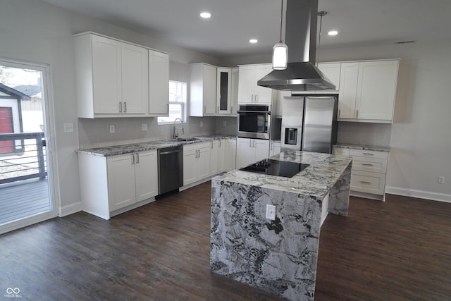 kitchen with stainless steel appliances, dark hardwood / wood-style flooring, island exhaust hood, pendant lighting, and white cabinets