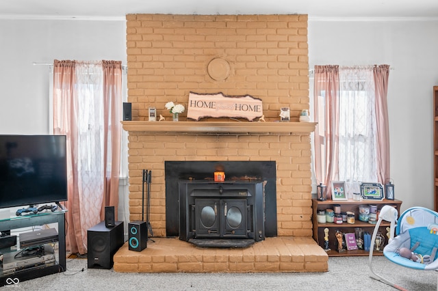 carpeted living room featuring crown molding