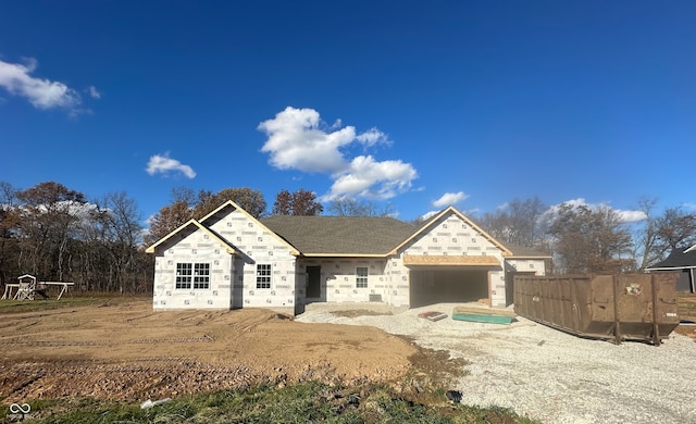 property in mid-construction featuring a garage