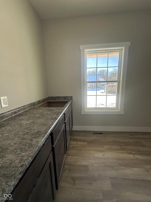 kitchen featuring dark wood-type flooring