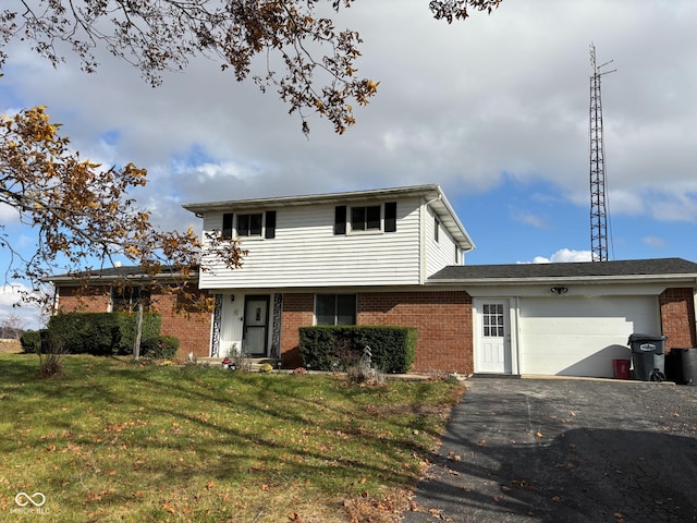 view of front facade featuring a garage and a front yard