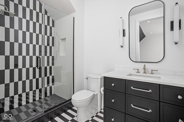 bathroom featuring vanity, toilet, walk in shower, and lofted ceiling