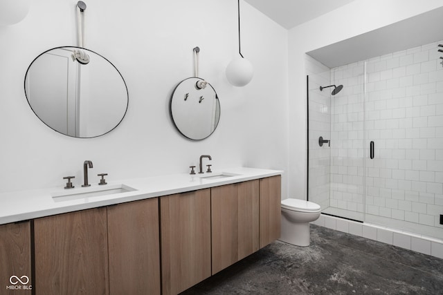 bathroom featuring toilet, vanity, and walk in shower