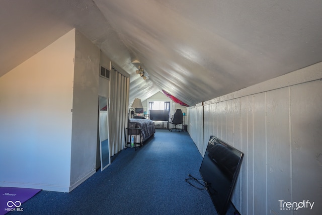 additional living space with lofted ceiling and carpet floors