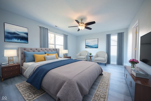 bedroom featuring light wood-type flooring and ceiling fan