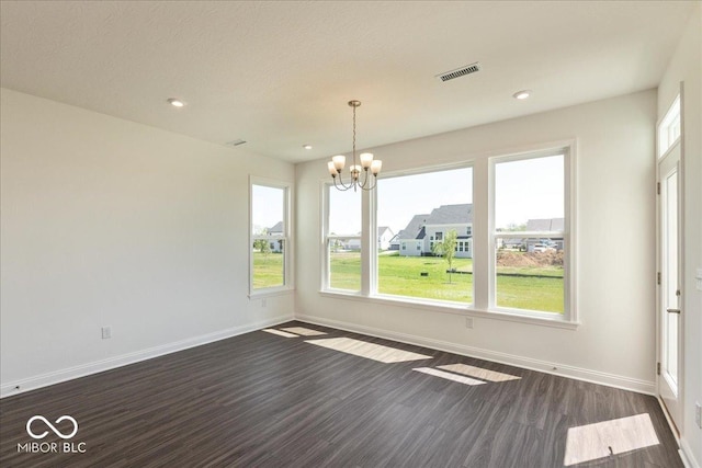 1105 Gatewick Ct, Greenwood, IN 46143 - unfurnished dining area featuring dark wood-style floors, a chandelier, baseboards, and recessed lighting