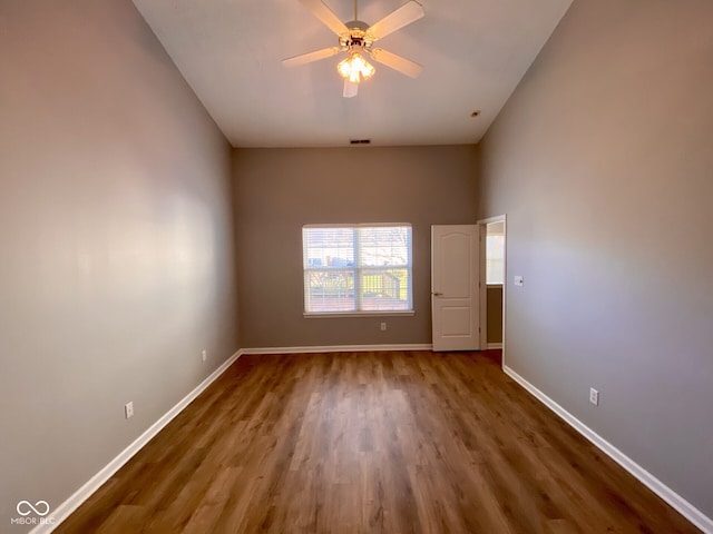 unfurnished room with wood-type flooring and ceiling fan