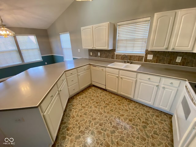 kitchen with white cabinets, white appliances, and vaulted ceiling