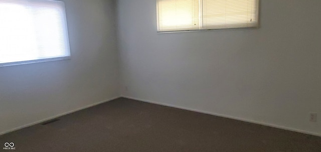 view of carpeted spare room