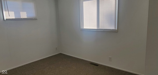 empty room with carpet floors