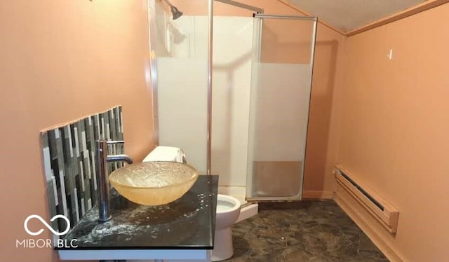 bathroom featuring a baseboard radiator, toilet, sink, an enclosed shower, and crown molding