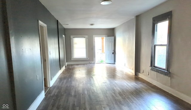 empty room featuring wood-type flooring