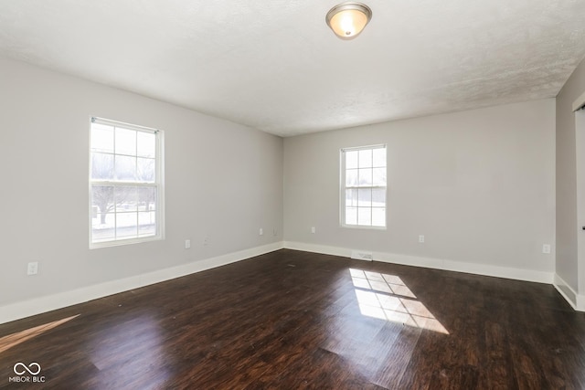5060 Staughton Dr, Indianapolis, IN 46226 - unfurnished room featuring wood finished floors and baseboards