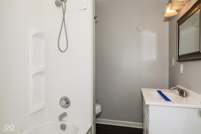 5060 Staughton Dr, Indianapolis, IN 46226 - bathroom with vanity, toilet, shower / bath combination, and baseboards
