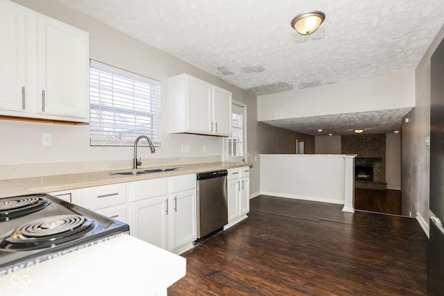 5060 Staughton Dr, Indianapolis, IN 46226 - kitchen with dishwasher, a sink, dark wood finished floors, white cabinets, and a textured ceiling