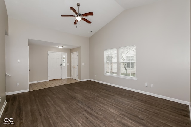 interior space with hardwood / wood-style flooring, high vaulted ceiling, and ceiling fan