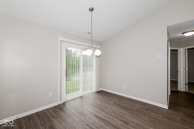 interior space featuring a notable chandelier and dark hardwood / wood-style flooring