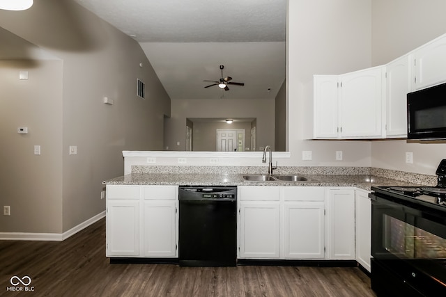 kitchen featuring black appliances, white cabinetry, sink, and dark wood-type flooring