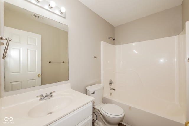 full bathroom featuring shower / tub combination, vanity, and toilet