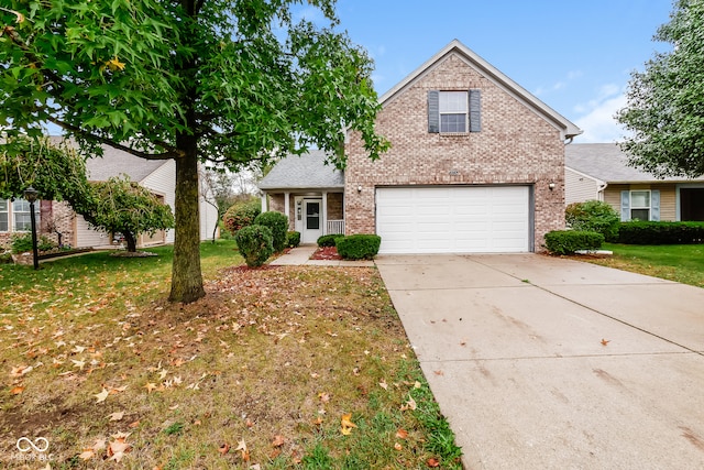 front facade with a garage and a front yard