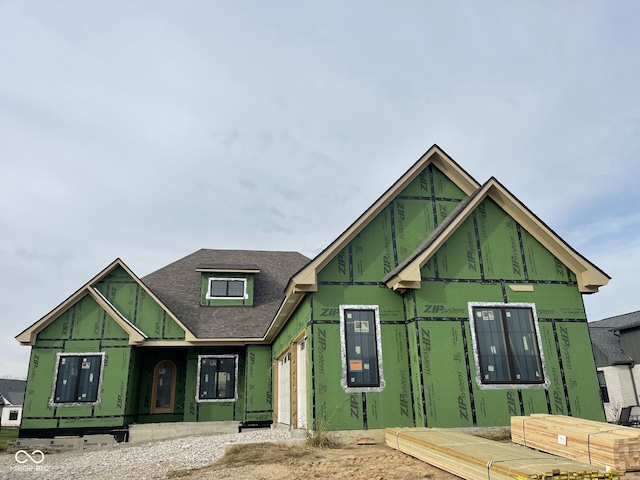 property in mid-construction with a garage