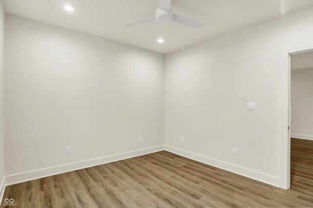 5469 Harness Dr, Greenwood, IN 46143 - empty room with wood finished floors, a ceiling fan, recessed lighting, and baseboards