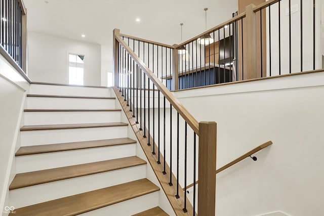 5469 Harness Dr, Greenwood, IN 46143 - stairway with recessed lighting and a high ceiling