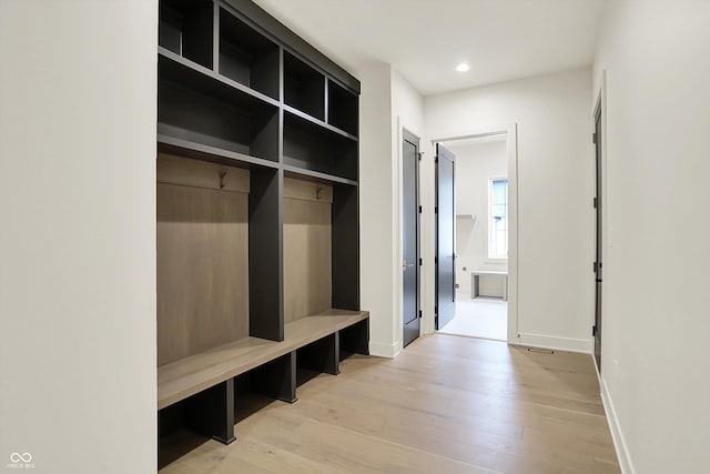 5469 Harness Dr, Greenwood, IN 46143 - mudroom with light wood-type flooring, recessed lighting, and baseboards
