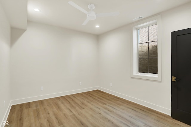 5469 Harness Dr, Greenwood, IN 46143 - spare room with wood finished floors, baseboards, recessed lighting, and a ceiling fan