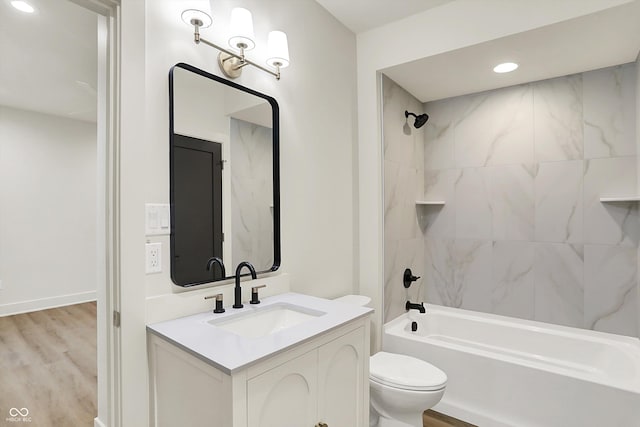 5469 Harness Dr, Greenwood, IN 46143 - full bathroom with vanity, shower / bathtub combination, wood finished floors, toilet, and recessed lighting