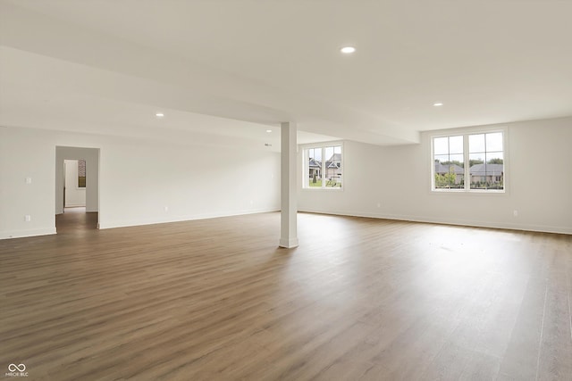 5469 Harness Dr, Greenwood, IN 46143 - below grade area with wood finished floors, recessed lighting, and baseboards