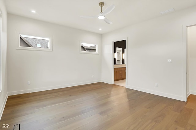 5469 Harness Dr, Greenwood, IN 46143 - spare room featuring wood finished floors, baseboards, a ceiling fan, and recessed lighting