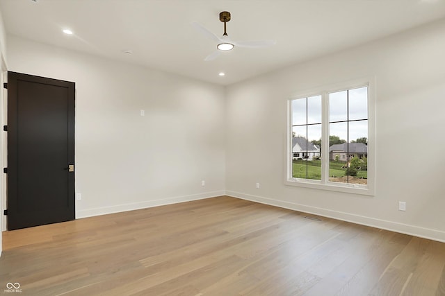 5469 Harness Dr, Greenwood, IN 46143 - empty room featuring baseboards, light wood finished floors, ceiling fan, and recessed lighting