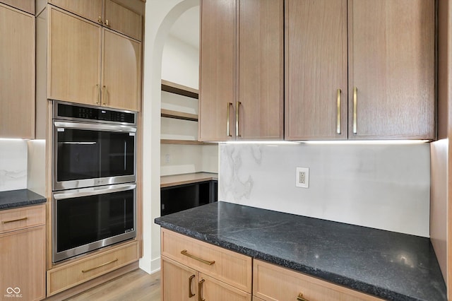 5469 Harness Dr, Greenwood, IN 46143 - kitchen featuring double oven, open shelves, light brown cabinets, and light wood-style floors