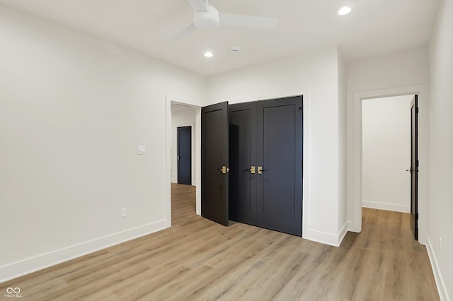 5469 Harness Dr, Greenwood, IN 46143 - unfurnished bedroom with light wood-type flooring, baseboards, recessed lighting, and a ceiling fan