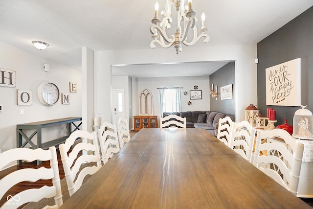 dining room with a notable chandelier