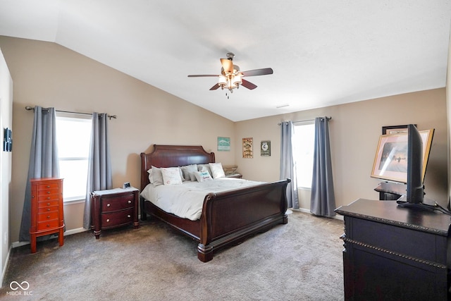 carpeted bedroom with ceiling fan and lofted ceiling