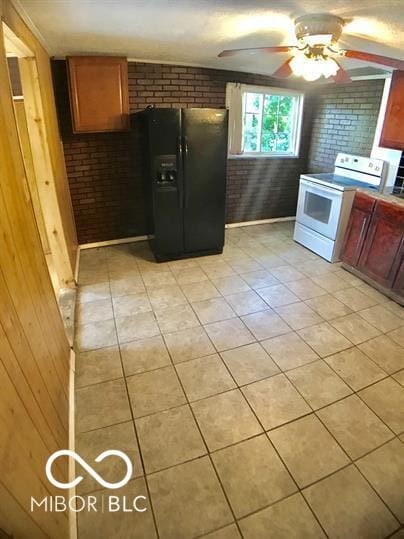 kitchen featuring brick wall, light tile patterned flooring, white electric range oven, black fridge with ice dispenser, and ceiling fan