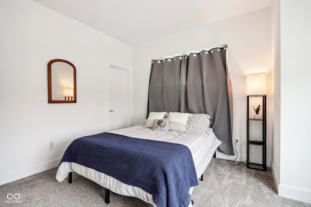 bedroom with light colored carpet