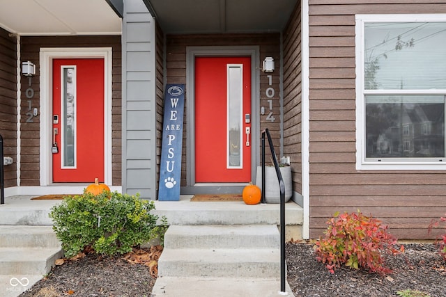 entrance to property featuring elevator