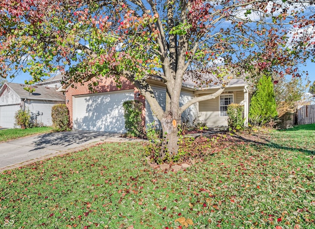 view of front facade featuring a garage and a front lawn