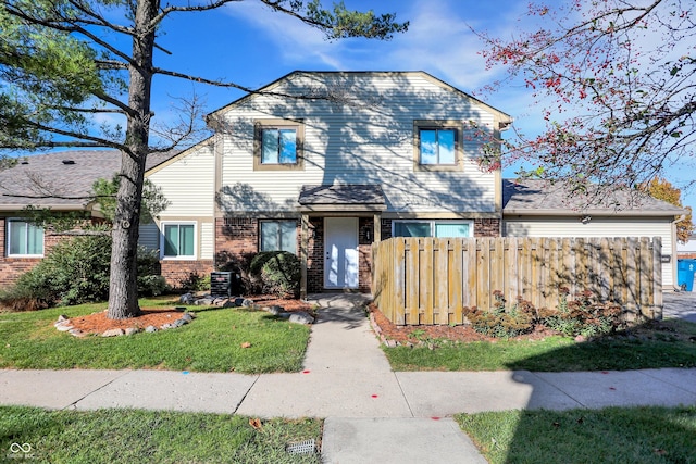 view of front of home with a front yard