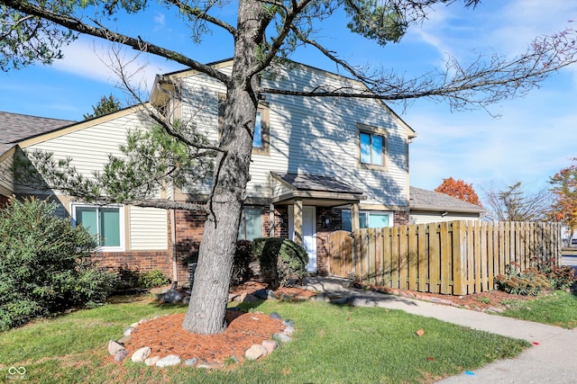 view of front of house with a front lawn